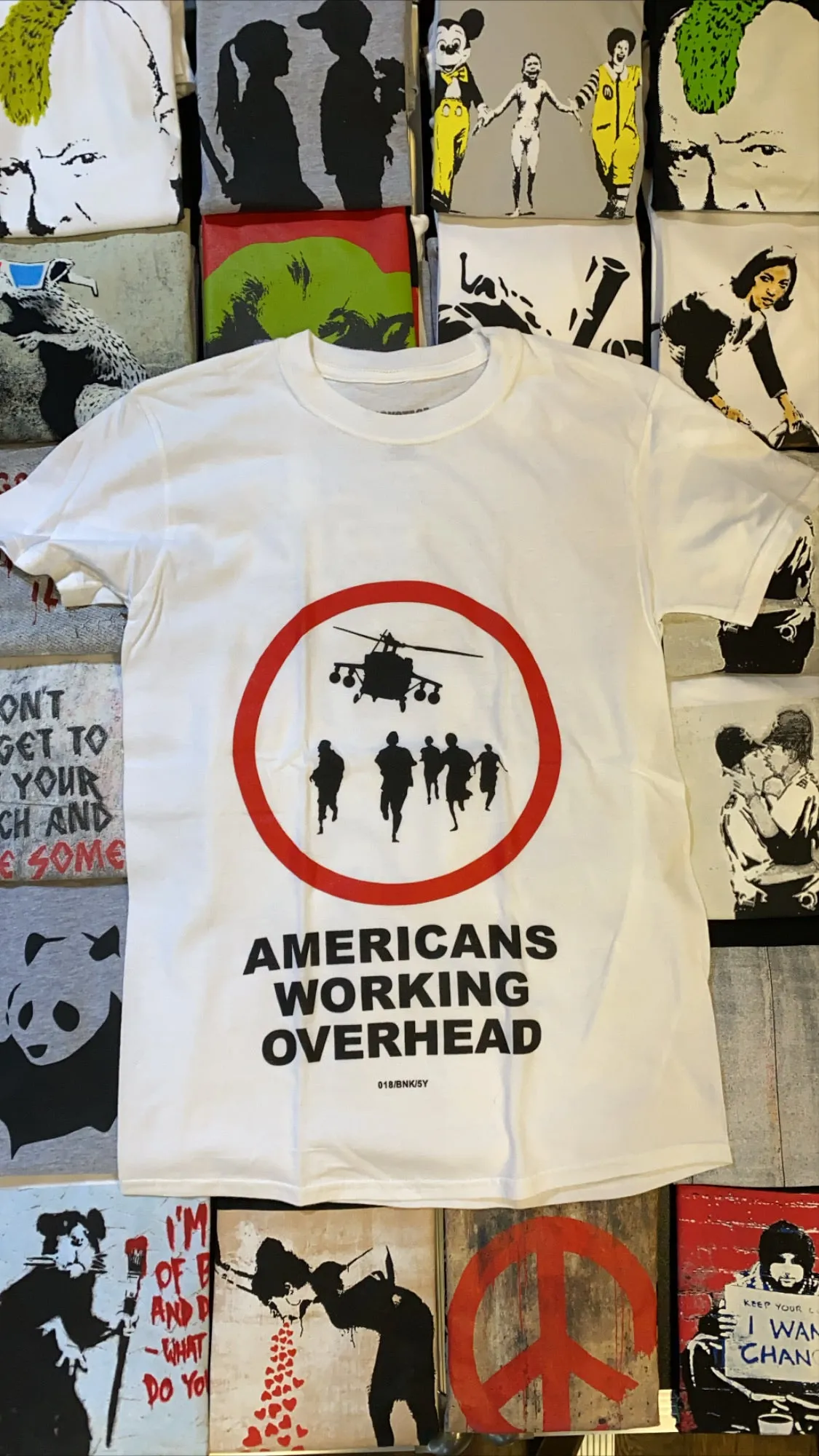 Banksy T-shirt - Americans Working Overhead